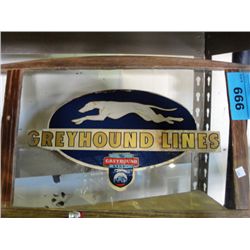 Wood framed greyhound lines sign