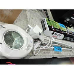Adjustable arm magnefying table lamp