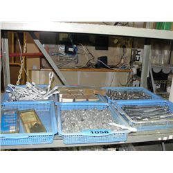 6 small blue baskets of assorted hardware