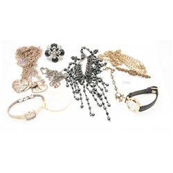 Small black jewelry purse and contents