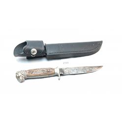 Bone handled hunting knife with black leather