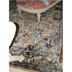 Approx 6F by 10F multi colored area rug