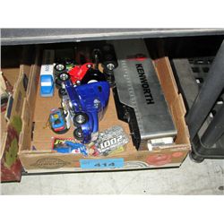 Box of assorted diecast metal trucks and cars