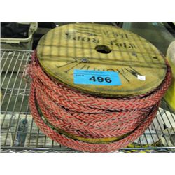 Spool of braided red rope