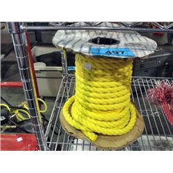 partial spool of yellow braided rope