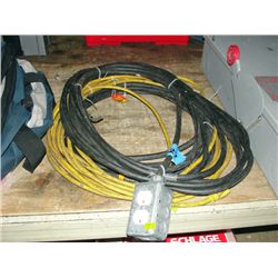 2 black heavy duty electrical cords and yellow