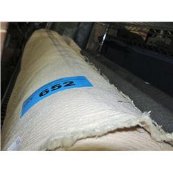 One roll of patterned off white fabric