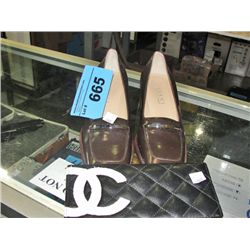 pair of gucci made in italy shoes and designer