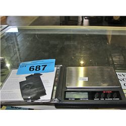 Digital scale camoflouged in CD music case