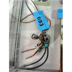 2 bolo ties and an indian chief ring all with
