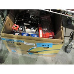 Box of diecast metal cars and trucks