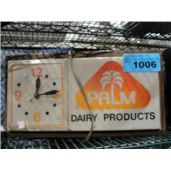 Vintage palm dairy products advertising clock