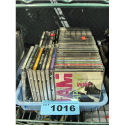 Small blue basket of music CDs