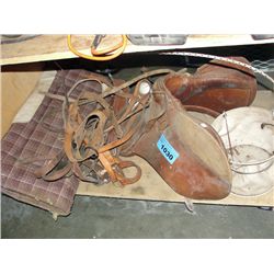 Shelf lot of assorted equistrian gear; saddle,