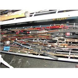 Shelf lot of fishing rods and reels