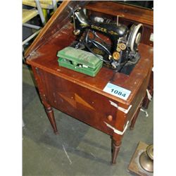 Vintage singer sewing machine with cabinet