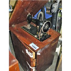Vintage Adler sewing machine with cabinet