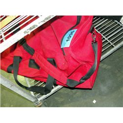 Campers tent in red duffle bag