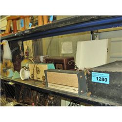 Shelf lot of assorted vintage record players,