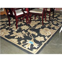 Black and gold area rug