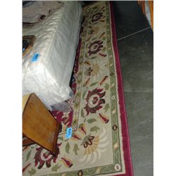 Multi colored burgandy area rug