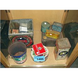 Shelf lot of assorted collectors tins