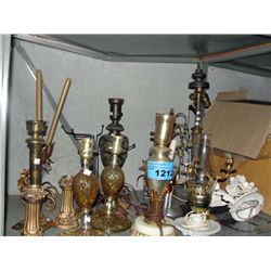 Shelf lot of assorted candle holders and table