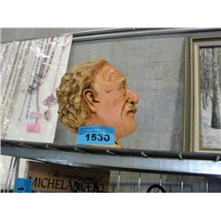 Carved wooden decorative bust