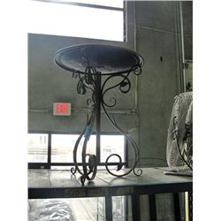 Crafted metal bird bath