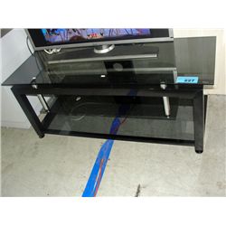 Black and glass TV entertainment stand