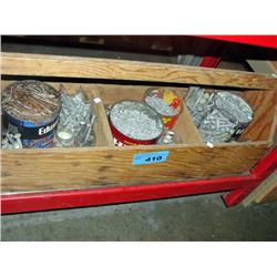 Carpenters wooden toolbox with a lot of washers
