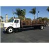 Image 1 : 2001 INTERNATIONAL 4700 SINGLE AXLE STAKEBED 6 CYL.