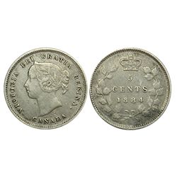Canada Five Cents Silver, 1884. Key Date. VF, hairlined and retoning.