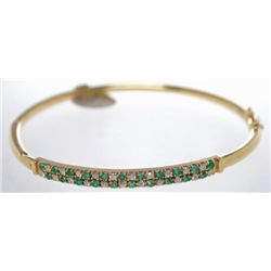 Pre-Owned 14k Yellow Gold Emerald and Diamond hinged bangle bracelet with safety