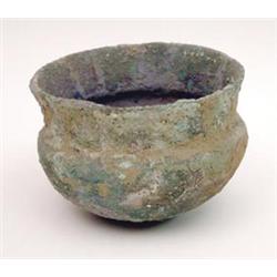 An ancient iron or bronze bowl with thick green verdigris, 6.5ins £50-70...