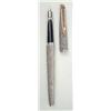 Image 1 : A Watermans engine turned silver C/F pen with gilt clip £60-80...