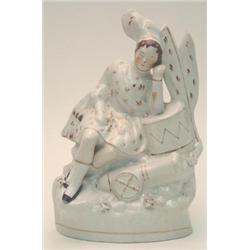 A Victorian Staffordshire flatback figure of a Scots Guard sleeping beside canon, 10ins £80-120...