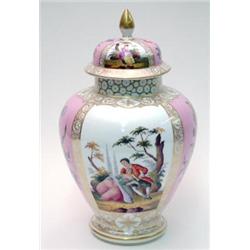 A late 19th century Helena Wolfsohn porcelain baluster vase with domed cover, painted with altern...