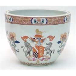 A 19th century Samson armorial porcelain jardiniere enamelled with coat of arms, urns and foliage...