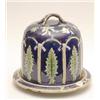 Image 1 : A Victorian majolica cheese dish and domed cover moulded and painted with flowers, leaves and rop...