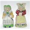 Image 1 : Two Staffordshire female figure character jugs, each brightly enamelled, 9ins and 8ins £60-80...