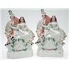Image 1 : A pair of Victorian Staffordshire flatback groups, each of a highlander with pipes and female com...
