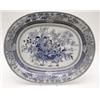 Image 1 : An early 19th century oval earthenware meat plate printed with a basket of flowers in blue, 1ft.6...