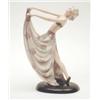 Image 1 : A Goldscheider Dakon figure of a lady with outstretched arms holding the pleats of her floral dec...
