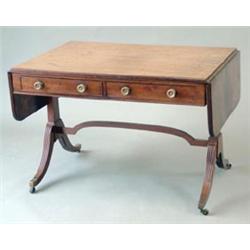 A George III mahogany sofa table, the rounded rectangular top over 2 short drawers and 2 dummy dr...