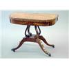 Image 1 : A Regency satinwood banded coromandelwood card table with folding D shaped top, scrolled stem and...