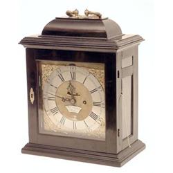 An 18th century repeating bracket clock movement with later ebonised case and associated dial, si...
