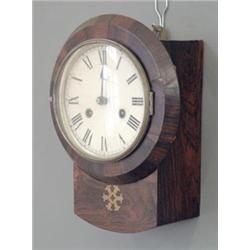 A late 19th century rosewood veneered wall clock with printed dial and inlaid brass roundel to tr...