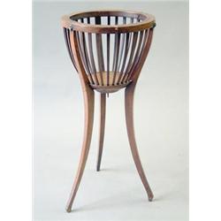 An Edwardian circular jardiniere stand on tripod square downswept legs, 1ft 2ins £70-100...