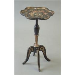 A Continental lobed circular floral painted papier mache wine table with baluster support and cab...